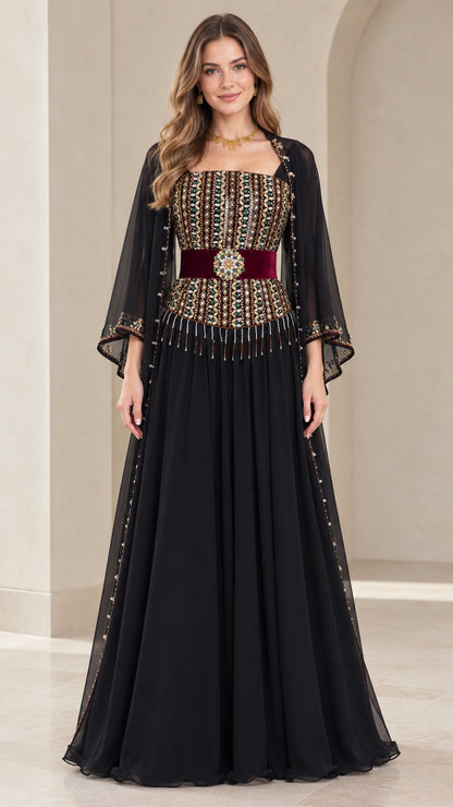 Front view of model wearing black embellished chiffon evening gown with cape sleeves