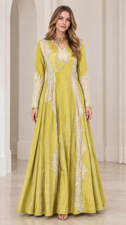 Front view of model wearing chartreuse green long sleeve embroidered maxi gown