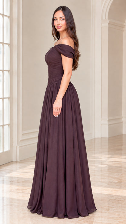 Side profile of model wearing plum off-the-shoulder evening gown