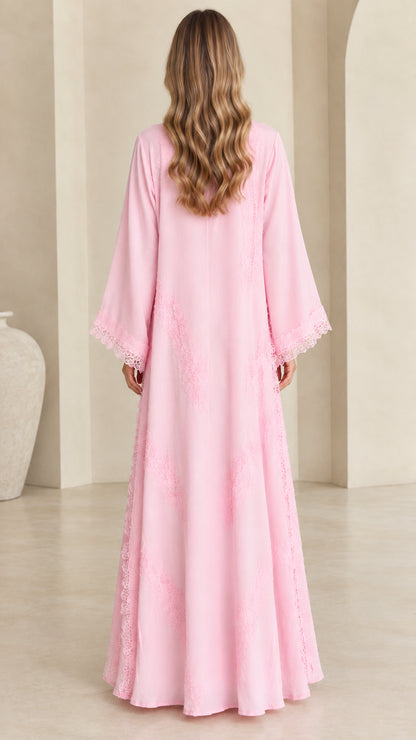 Back view of model wearing floor-length pastel pink open abaya cardigan