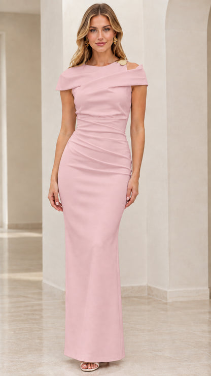 Front view of model wearing blush pink asymmetrical ruched formal dress