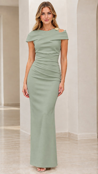 Front view of model wearing sage green ruched maxi evening gown