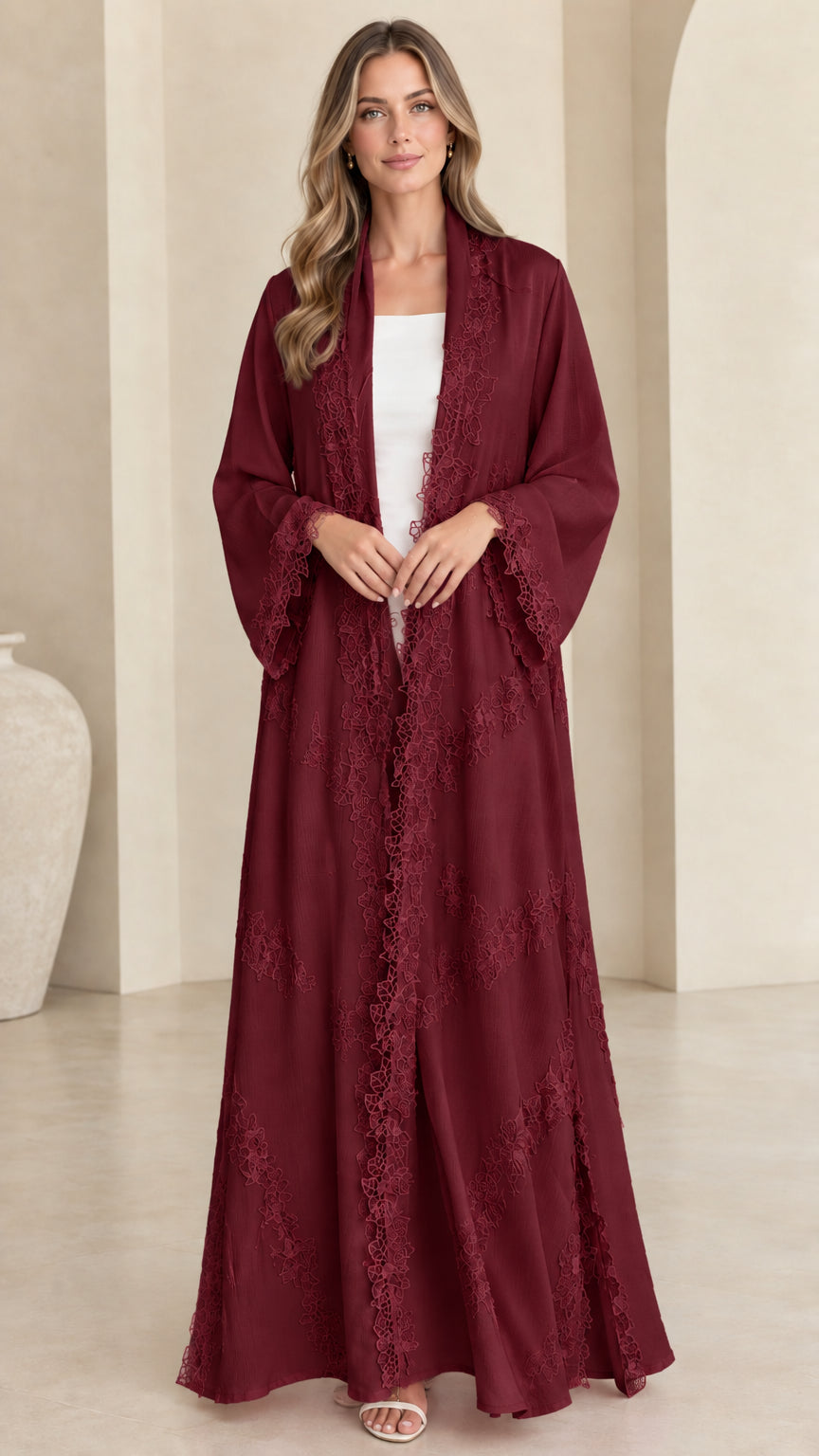 Front view of model wearing rich burgundy wine red lace trim open maxi abaya
