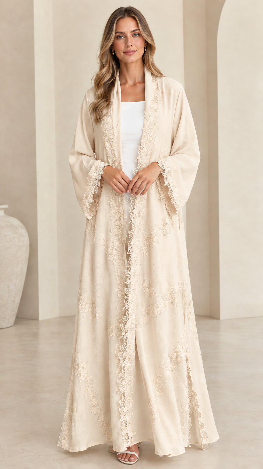 Front view of model wearing elegant cream beige lace trim open maxi abaya