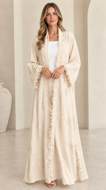 Front view of model wearing elegant cream beige lace trim open maxi abaya