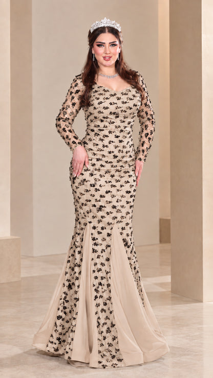 Front view of model wearing champagne nude sequin mermaid evening gown