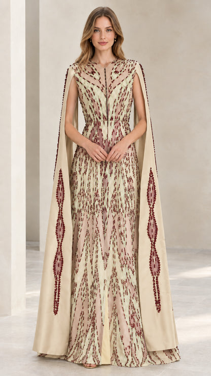 Model wearing champagne beige beaded cape sleeve evening maxi dress