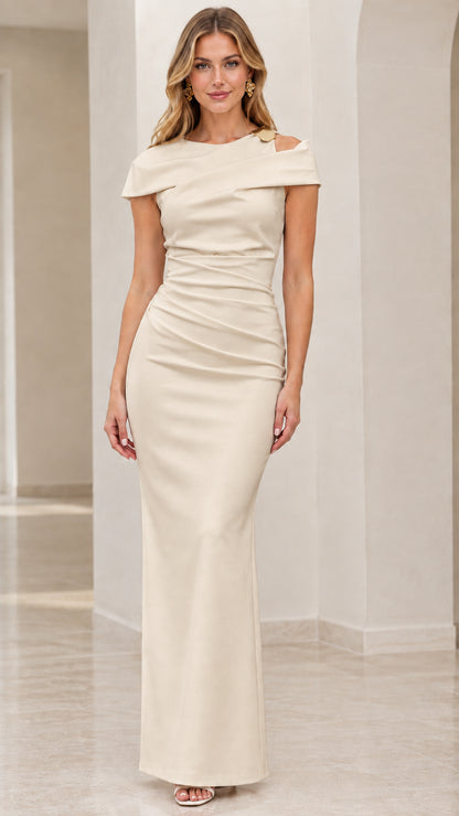 Front view of model wearing champagne cream ruched formal maxi gown
