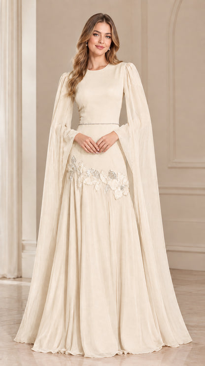 Model wearing Champagne ivory floor-length cape sleeve evening gown